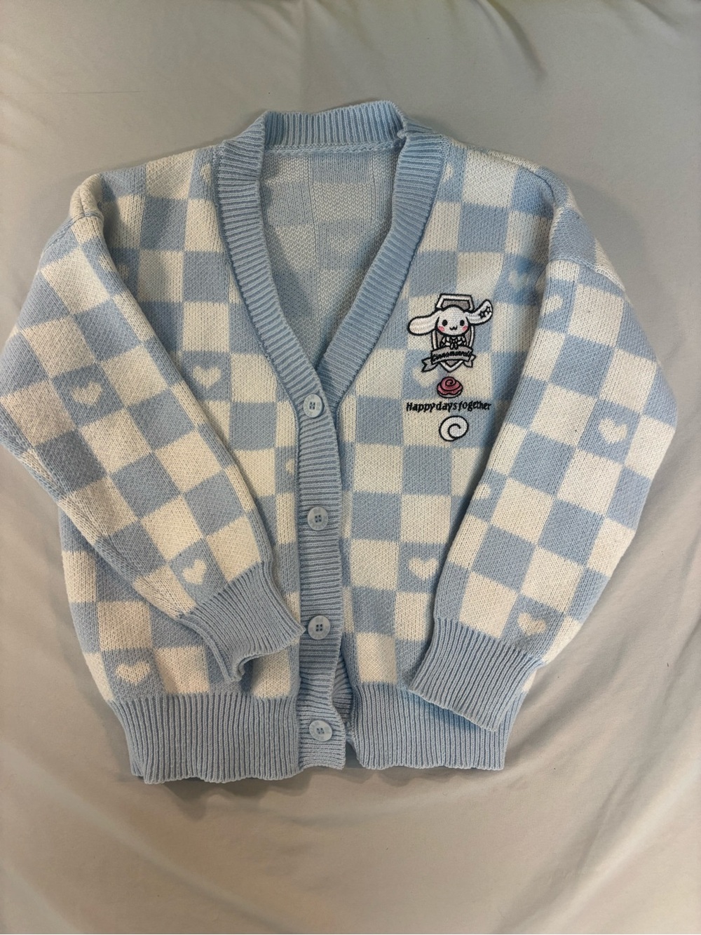 Blue & White Checkered Heart Cardigan with cinnamon
